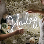 Hailey Name LED Neon Sign in customizable LED tubing, personalized wall-mounted name light décor by Neon.Shop for bedrooms, events, and gifts