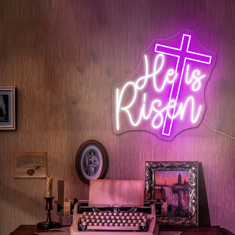 He Is Risen neon wall sign featuring glowing LED lettering representing the resurrection message of Easter by Neon.Shop