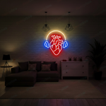 Headphones Heart LED neon sign by Neon.Shop glowing on a wall as modern music-inspired neon décor
