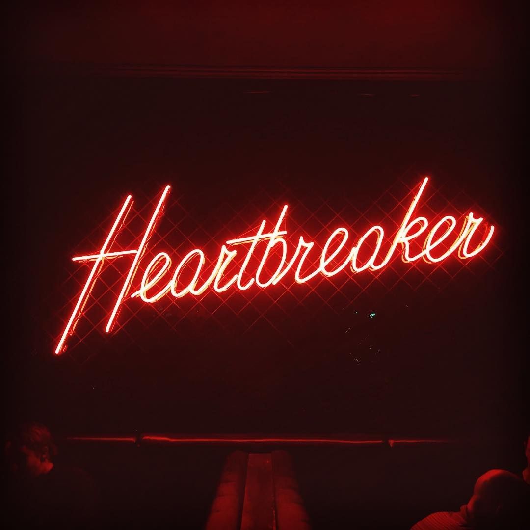 Heartbreaker Valentine’s Day LED neon sign glowing in bold romantic tones, ideal for bedroom décor, Valentine’s gifts, bars, cafés, and edgy love-themed displays by Neon.Shop.