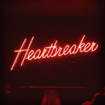 Heartbreaker Valentine’s Day LED neon sign glowing in bold romantic tones, ideal for bedroom décor, Valentine’s gifts, bars, cafés, and edgy love-themed displays by Neon.Shop.