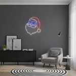Hipster Santa Merry Christmas LED neon sign glowing in festive colors by Neon.Shop.