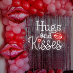 Hugs and Kisses Lips Neon Sign glowing on wall for romantic décor by Neon.Shop
