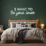 I Want To Be Your Lover” Valentine’s Day LED neon sign glowing in romantic pink and red tones, perfect for love-themed décor by Neon.Shop