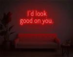 I’d Look Good On You” Valentine’s Day LED neon sign glowing in playful pink and red tones, perfect for romantic décor by Neon.Shop