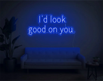I’d Look Good On You” Valentine’s Day LED neon sign glowing in playful pink and red tones, perfect for romantic décor by Neon.Shop