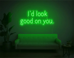 I’d Look Good On You” Valentine’s Day LED neon sign glowing in playful pink and red tones, perfect for romantic décor by Neon.Shop