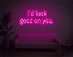 I’d Look Good On You” Valentine’s Day LED neon sign glowing in playful pink and red tones, perfect for romantic décor by Neon.Shop