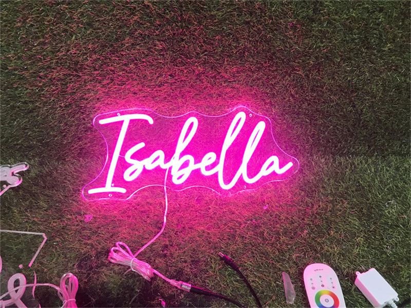 ISABELLA Name LED Neon Sign by Neon.Shop glowing brightly, custom LED name light for bedroom décor, nurseries, beauty studios, parties, and modern home styling.