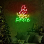 Joy Love Peace Merry Christmas Neon Sign by Neon.Shop with glowing festive lettering for holiday décor.