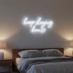 Keep Slaying Hun’ LED neon sign glowing brightly, ideal for beauty salons, glam rooms, and empowering home décor by Neon.Shop
