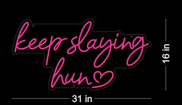 Keep Slaying Hun’ LED neon sign glowing brightly, ideal for beauty salons, glam rooms, and empowering home décor by Neon.Shop