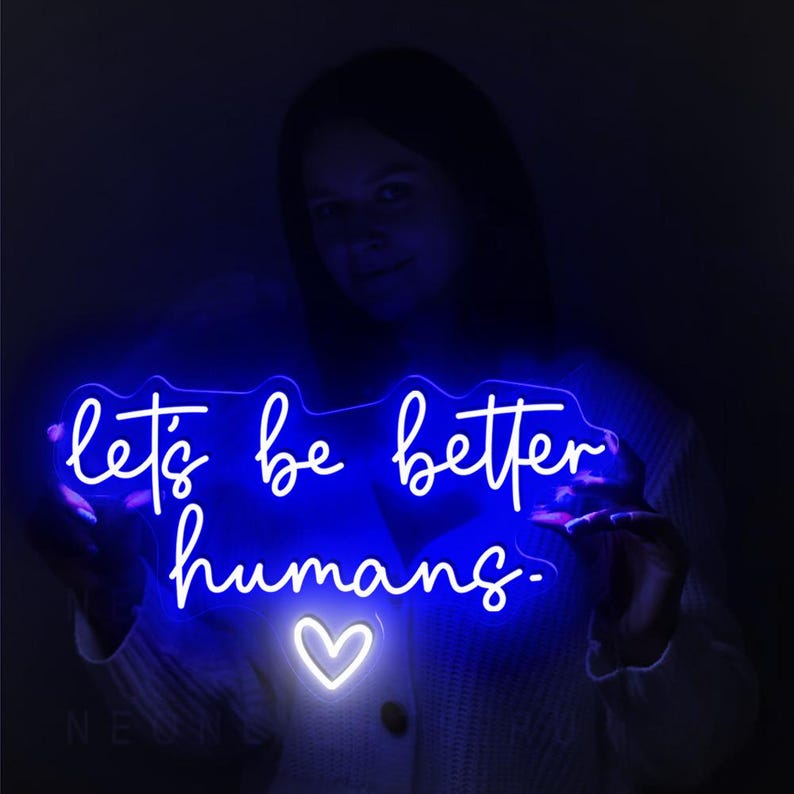 Let’s Be Better Humans neon sign glowing in bright LED colors by Neon.Shop 