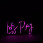 Let’s Play LED neon sign glowing brightly, perfect for gaming rooms and entertainment spaces by Neon.Shop