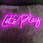 Let’s Play LED neon sign glowing brightly, perfect for gaming rooms and entertainment spaces by Neon.Shop