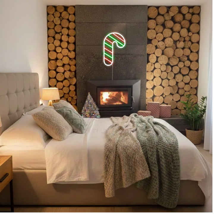 Light Up Candy Cane Merry Christmas Neon Sign by Neon.Shop glowing in LED light with candy cane and festive lettering design.