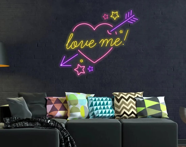 Love Me Valentine's Day Neon Sign by manhattanneons.com – A vibrant neon declaration of love.