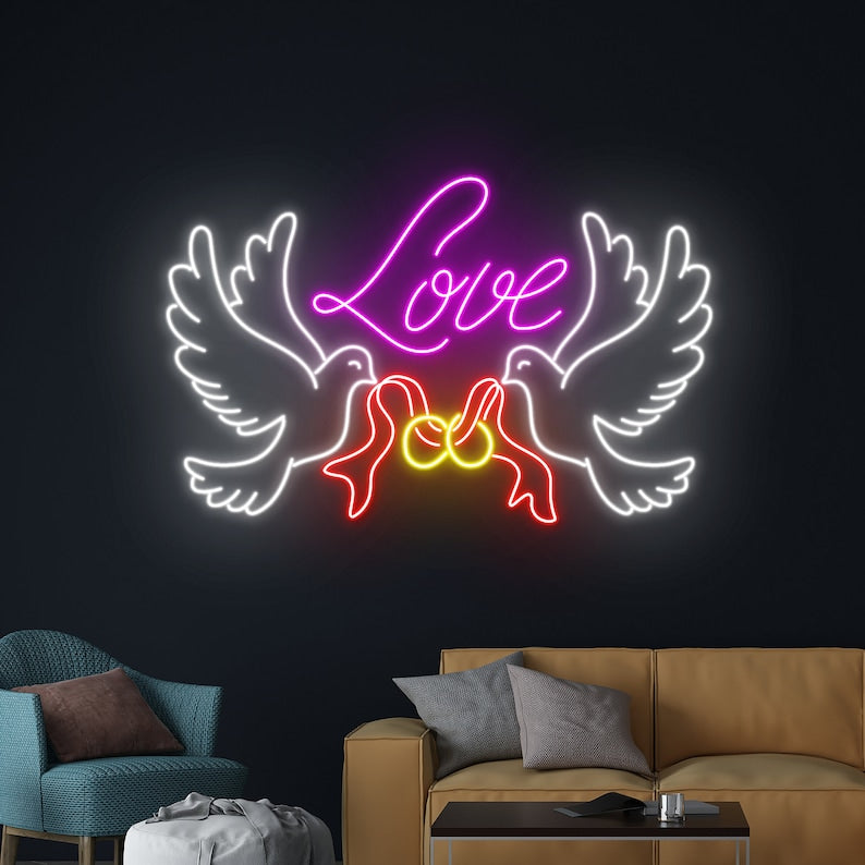 Love Dove Rings Valentine’s Day Neon Sign glowing on wall for romantic décor by Neon.Shop