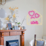Love Envelope Valentine’s Day Neon Sign glowing on wall for romantic décor by Neon.Shop