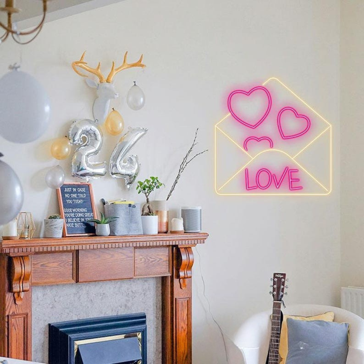 Love Envelope Valentine’s Day Neon Sign glowing on wall for romantic décor by Neon.Shop