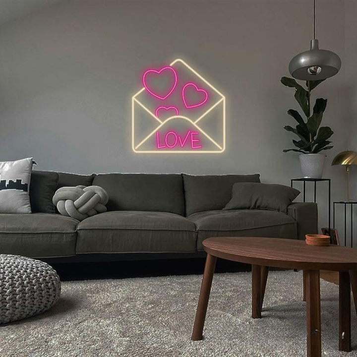 Love Envelope Valentine’s Day Neon Sign glowing on wall for romantic décor by Neon.Shop