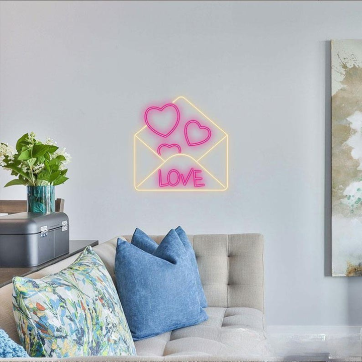 Love Envelope Valentine’s Day Neon Sign glowing on wall for romantic décor by Neon.Shop