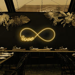 Love Infinity Valentine’s Day LED neon sign glowing with romantic light, symbolizing eternal love by Neon.Shop
