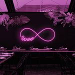 Love Infinity Valentine’s Day LED neon sign glowing with romantic light, symbolizing eternal love by Neon.Shop