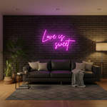Love Is Sweet Valentine’s Day neon sign glowing in warm LED lights, romantic wall décor by Neon.Shop