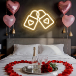 Love Lock Valentine’s Day Neon Sign displayed in café, wedding, or proposal setup by Neon.Shop