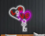 Love Lock Valentine’s Day neon sign glowing in LED light, heart-shaped romantic wall décor by Neon.Shop.