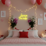 Love On The Rocks Valentine’s Day LED neon sign glowing in bold romantic tones, perfect for bedroom décor, home bars, Valentine’s gifts, and playful love-themed spaces by Neon.Shop.