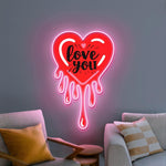 Melting Heart Love You UV Print Neon Sign displayed in wedding or proposal setup by Neon.Shop