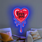 Melting Heart Love You UV Print Neon Sign displayed in wedding or proposal setup by Neon.Shop