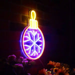 Tree Ornament Merry Christmas Neon Sign by Neon.Shop featuring glowing Christmas ornament design with festive Colors 