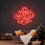 Merry Christmas Typo Neon Sign by Neon.Shop glowing in quirky vibrant LED colors for festive décor.