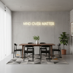 Mind Over Matter LED neon sign by Neon.Shop glowing on a wall as modern motivational neon décor