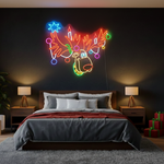 Multicolor Reindeer Merry Christmas LED neon sign glowing in festive colors by Neon.Shop.