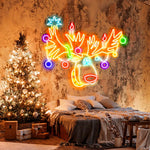 Multicolor Reindeer Merry Christmas LED neon sign glowing in festive colors by Neon.Shop.