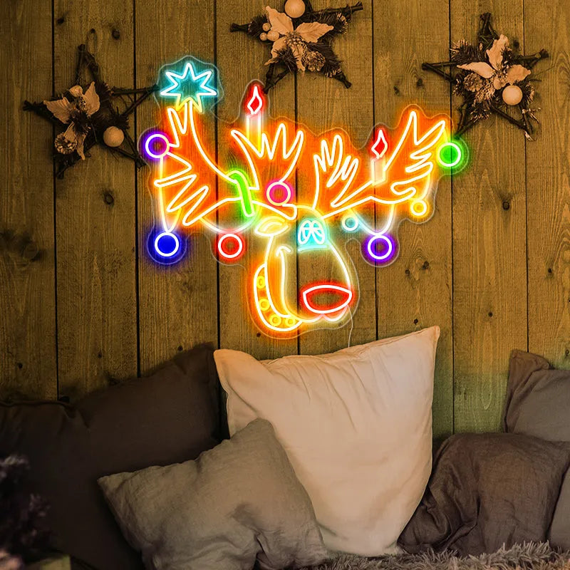 Multicolor Reindeer Merry Christmas LED neon sign glowing in festive colors by Neon.Shop.