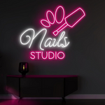 Nails Studio neon sign by Neon.Shop illuminating a beauty studio storefront