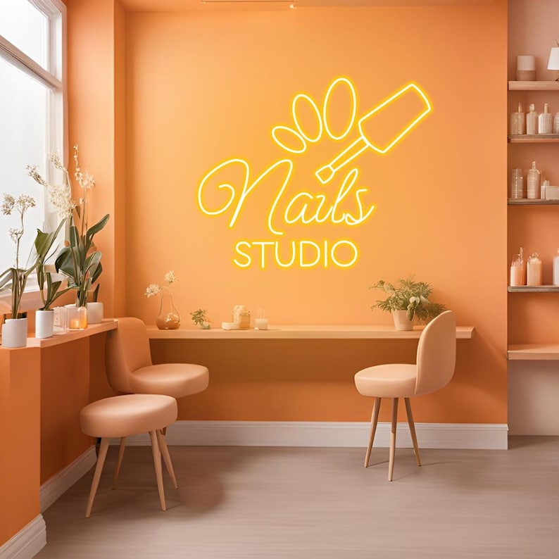 Nails Studio neon sign by Neon.Shop illuminating a beauty studio storefront