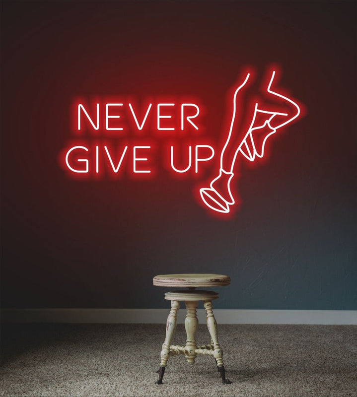 Never Give Up” glowing neon sign, encouraging persistence and determination for home, gym, or workspace décor by Neon.Shop.