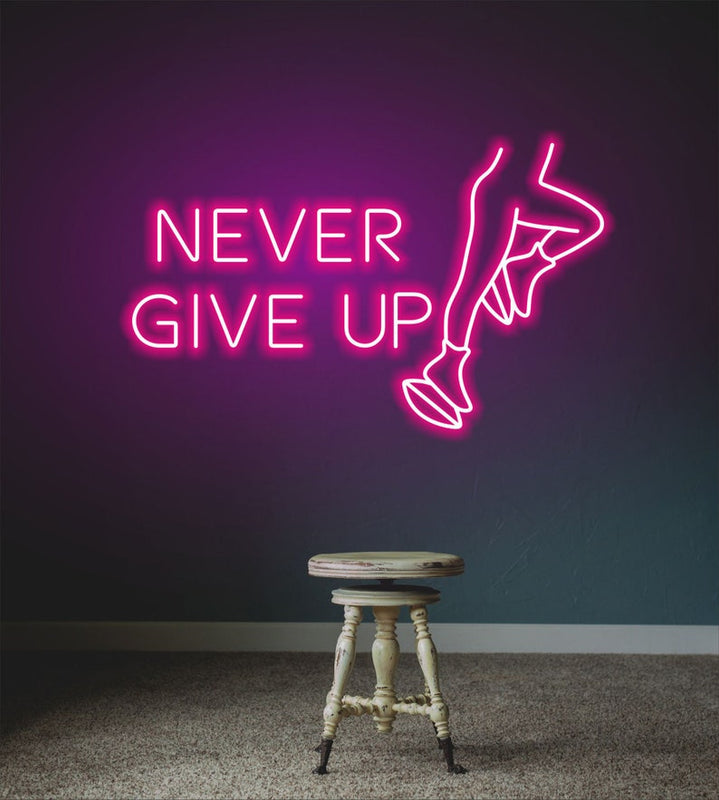 Never Give Up” glowing neon sign, encouraging persistence and determination for home, gym, or workspace décor by Neon.Shop.