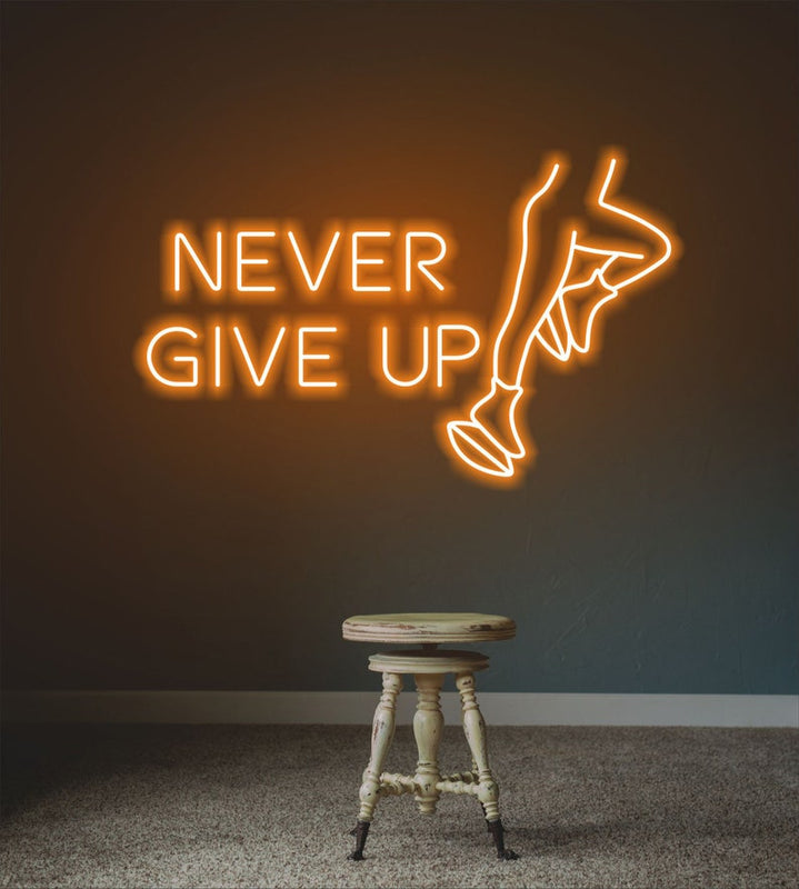 Never Give Up” glowing neon sign, encouraging persistence and determination for home, gym, or workspace décor by Neon.Shop.