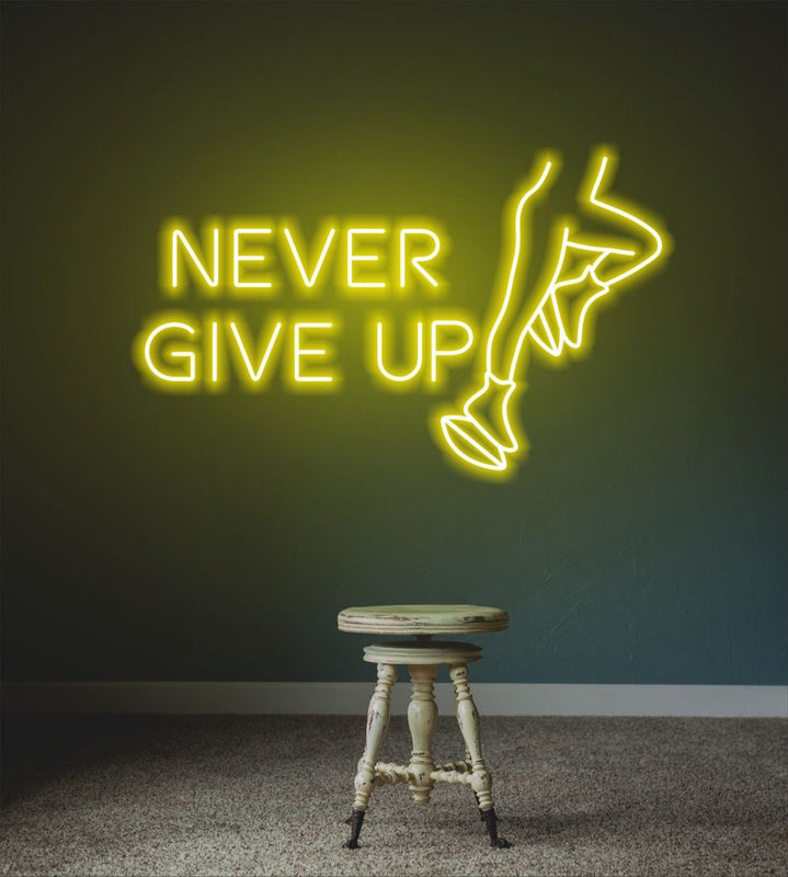 Never Give Up” glowing neon sign, encouraging persistence and determination for home, gym, or workspace décor by Neon.Shop.