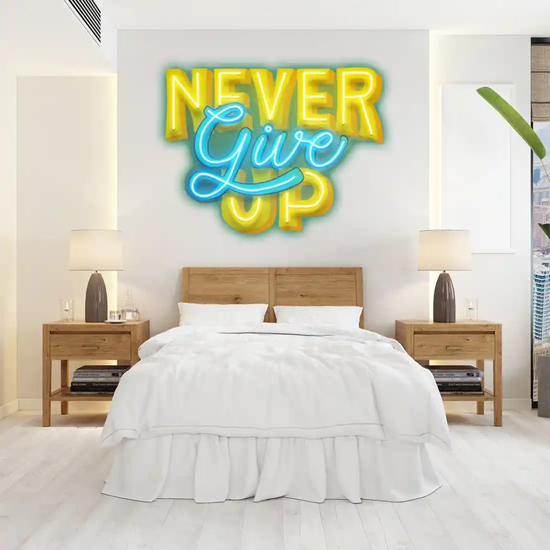 Never Give Up UV Art LED neon sign with bold motivational design glowing in vibrant colors by Neon.Shop