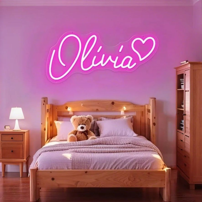 OLIVIA LED Neon Name Sign by Neon.Shop adding vibrant LED glow to bedrooms, home offices, and living spaces.