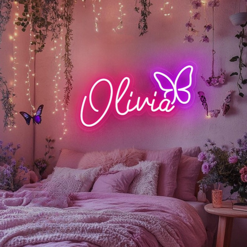 OLIVIA LED Neon Name Sign by Neon.Shop adding vibrant LED glow to bedrooms, home offices, and living spaces.