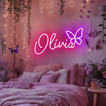 OLIVIA LED Neon Name Sign by Neon.Shop adding vibrant LED glow to bedrooms, home offices, and living spaces.